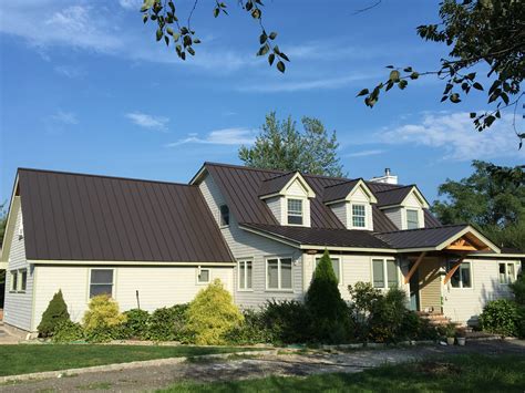 houses with a bronze metal roof|dark bronze metal roof pictures.